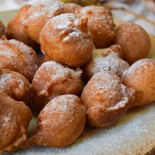 Soft yogurt donut holes dusted with powdered sugar